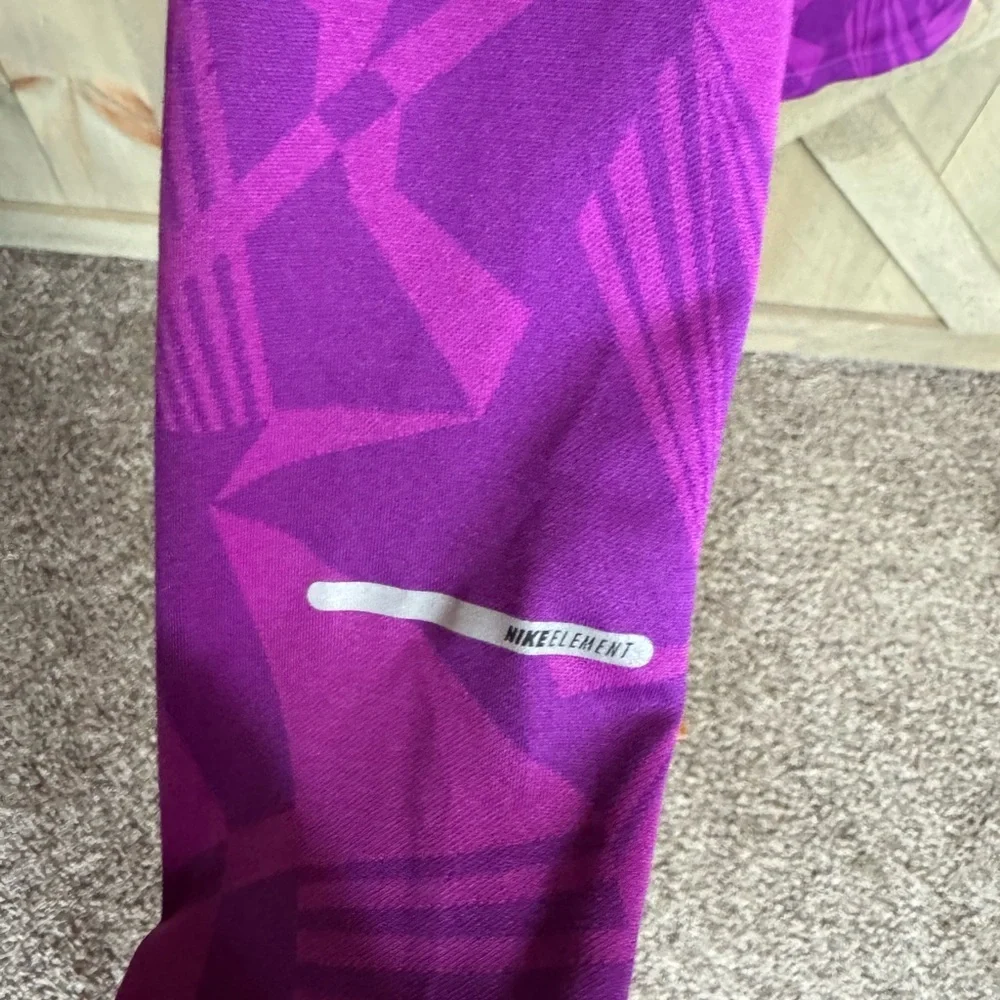 Nike Dri-Fit running top with reflective details Size Medium Magenta / pink